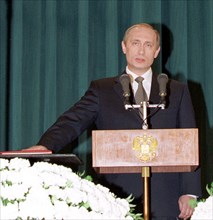 Vladimir putin taking the oath of office during his inauguration, may 6, 2002.