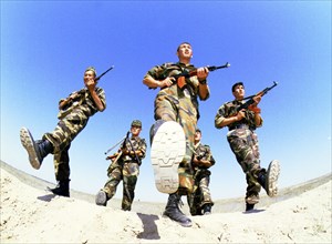 Kazakhstan, september 13, 2000,  young kazakh soldiers enjoy their participation in international exercises