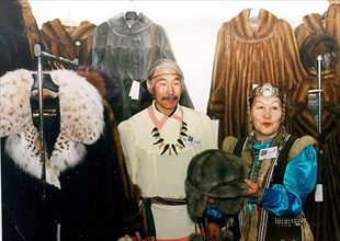 Khabarovsk, far east, russia 2003: the picture shows vasily and valentina aglasov demonstrating products of the yakut fur producing center named ytyk-haya at the amur commercial and industrial fair, p...