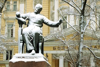 A monument to composer pyotr tchaikovsky covered with snow, in front of the moscow conservatory of music, moscow, russia, december 17 2000.