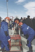 Kazakhstan, 27,03,2001: picture shows workers preparing to open the gate-valve of the 'tengiz-black sea' oil pipeline