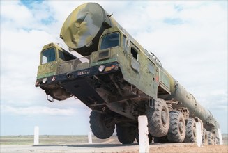 Astrakhan region, russia, may 15 2001: a multi-axle prime mover (in pic) is not that simple to drive, there is a big autodrome at kapustin yar for training drivers for heavy prime movers used for tran...