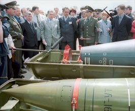 Kurgan region, june 9 2001: members of the russian governmental delegation, headed by vice-premier ilya klebanov (center), and foreign specialists viewing missile warheads, filled with chemical agents...