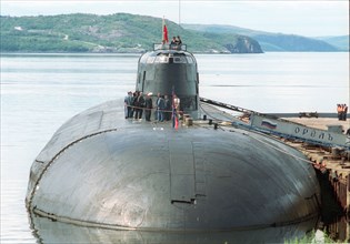 A group of russian journalists led by presidential aide sergei yastrzhembsky seen visiting the oryol nuclear submarine, which is of the same type as the kursk, the divers are being drilled for the lif...