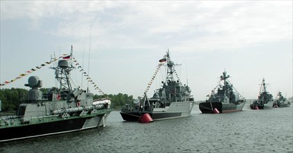 Warships of the caspian flotillia stand in formation on the volga river, astrakhan, russia, july 29, warships of the caspian flotillia stand in formation on the volga river during the festivities to m...