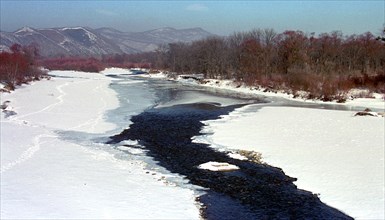 Maritime territory, far east, russia, march 2002, partizanskaya river in early spring.