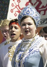 Tatarstan, russia, elvira fazlutdinova, the soloist of the 'ivushka' folk ensemble from kazan, performing at the karavon festival held in the village of russkoye nikolskoye on may 27, 2002, the day of...