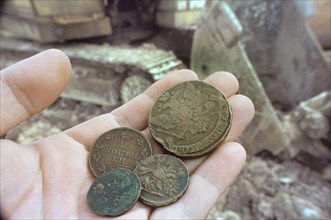 Old russian coins of 1770, 1785 and 1814 were found by archaeologists in the center of chelyabinsk, russia, 2002  .