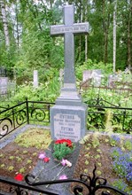 A gravestone marking the graves of vladimir spiridonovich putin (1911-1998) and maria ivanovna putina (1911-1999), the parents of russian president vladimir vladimirovich putin, at the serafimov cemet...