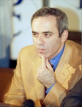 Chess grandmaster garri kasparov at a press conference held in the itar-tass headquarters june 11, 2002, on the forthcoming match, russia vs, the world, due in september.