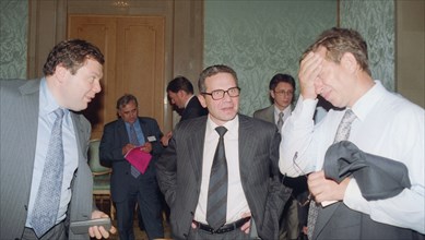 Moscow,russia, june 18 2002: left to right: the chairman of the board of alfa bank mikhail fridman, director general of 'mediasorcium' oleg kiselyov, and vladimir yevtushenkov, the president of the 's...