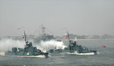 Russian navy day celebrations in astrakhan, russia, july 28, crews of the armoured boats (in pic) demonstrate their combat skills during the festivities on the occasion of the russian navy day, in ast...