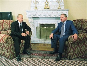Russian president vladimir putin and ukrainian president leonid kuchma during their informal round of talks at putin's zavidovo country residence.