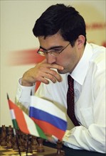 Grand master vladimir kramnik (russia) playing during the last tour of the 'chess match of the century' between russia's national team and the world team, moscow, russia, september 12 2002.