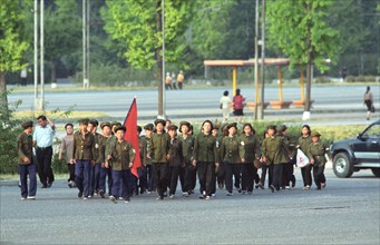 Korean people's democratic republic,, october 17 2002: young pioneers of north korea pictured marching along the streets of pyongyang,the capital of the kpdr under the red flag , (photo itar-tass/ bor...