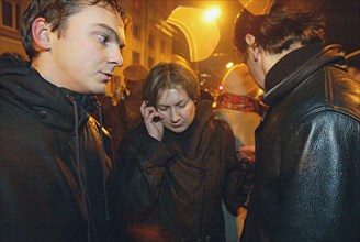 Moscow, russia, 10/24,/02: yelena shmelyova the press-secretary of the nord-ost musical talking by phone about the situation in a palace of culture seized by terrorists on wednesday evening, people, w...