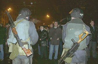 Moscow, russia, 10/24/02: squads of special troops pictured cordoning off the area near the palace of culture seized by terrorists on wednesday evening, people, who had come to watch the musical play ...