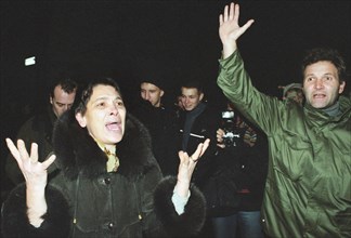 Moscow, russia, october 24 2002: people outside on the street shout as they volunteer to be substitutes for the hostages held inside the dubrovka theatrical center by chechen terrorists, on thursday.
