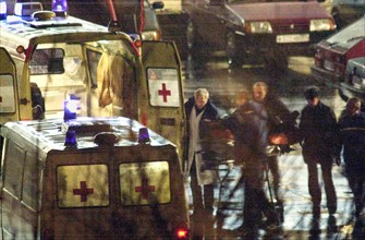 Moscow, russia, october 26 2002: chechen hostage crisis: a dead body is brought to an ambulance, presumably it is the body of the man who entered the building tonight, probably a relative of a hostage...