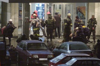 Moscow, russia,10/26/02: chechen hostage crisis: special forces personnel carry out the hostages, barayev and 35 terrorists including those with explosives attached to their bodies, were killed, the h...