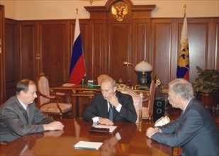Moscow, russia,10/26/02, chechen hostage crisis: president vladimir putin (c) had a working meeting with federal security service chief nikolai patrushev (l) and interior minister boris gryzlov (r), t...
