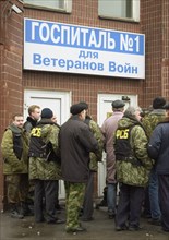 Moscow, russia,10/26/02: chechen hostage crisis: near the entrance of the hospital for war veterans, there are still many servicemen around public buildings in the vicinity of the theatre centre where...