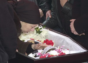 Moscow, russia, october 30 2002: funerals of soloists of the nord-ost musical kristina kurbatova and arseniy kurilenko who perished in terrorist attack against the dubrovka theatrical centre, the arti...