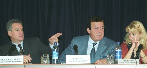 Moscow, russia, october 31 2002, left to right: presidential aide sergei yastrzhembsky, state duma deputy and singer iosif kobzon and an ex-hostage olga chernyak at the press conference about the rece...