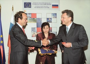 moscow,russia, november 5 2002: eu-russia energy dialogue technology centre opens in moscow, russian vice-premier viktor khristenko (r) greets european commission's director general for transport and ...