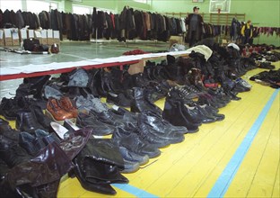 Moscow, russia, november 12 2002: former hostages retrieving their personal belongings at the sports hall of the dubrovka theatre centre on tuesday, the moscow prosecutor's office has started to retur...