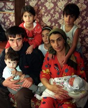 Belarus, november 12, 2002: salam machigov, his wife khedy and their children are renting an apartment in brest