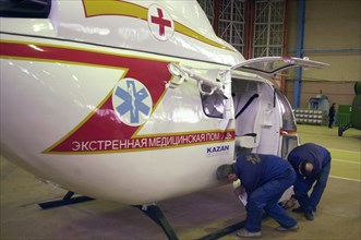 Tatarstan,russia, november 27 2002: the 'ansat' multi- purpose helicopter in the variant of an air-ambulance pictured in the assembly shop of the 'kazan helicopter plant', the helicopter designed both...