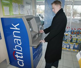 Russia, december 17 2002, one of automated teller machines of citibank installed on the premises of bp filling stations, besides dispensing cash the machines can manage any kind of non-cash money tran...