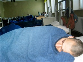 Vladimir region,russia, january 13 2003: an in-patient seen at the hospital of the training centre of moscow military district, more and more soldiers have been rushed here this january with the diagn...