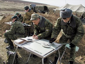 Tajikistan, february 18, 2002, servicemen of the russian 201st division pictured during the military exercises held on the 'lyaur' training range in the south of tajikistan, units of a separate batall...