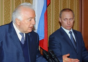 President vladimir putin (r) listensto his georgian counterpart eduard shevardnadze at their meeting in sochi on friday, the presidents discussed ways for a settlement in abkhazia, march 3, 2003.