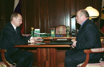 Russian president vladimir putin during a meeting with mikhail fradkov (r) former head of the federal tax police service who was appointed russia’s representative at the european union, 3/03, vladimir...
