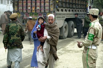 Afghanistan, 17,03,2003, thousands of people cross daily the border between afghanistan and pakistan through tourkham border crossing point (in pic), there are many families that are still separated a...