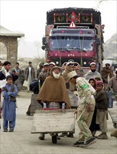 Afghanistan, march 17 2003, thousands of people cross daily the border between afghanistan and pakistan through tourkham border crossing point, there are many families that are still separated as the ...
