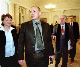 State hermitage director mikhail piotrovsky (r) and president of the interros company vladimir potanin (front) pictured following the latter's election as the chairman of board of trustees of state he...