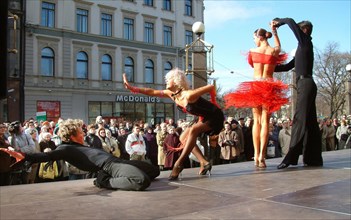 Riga, latvia, april 25, 2003, young performers of classical and modern dances giving an open-air concert within the framework of the international ballet festival which opened in riga on thursday.