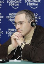 Yukos ceo mikhail khodorkovsky taking part in the work of moscow session of world economic forum on friday, where he declared that the unification of the two russian oil giants yukos and sibneft had b...