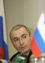 Head of the yukos oil company, mikhail khodorkovsky pictured at a press conference as the company reported on year results for the second quarter and first half of 2003 today, october 20, 2003.