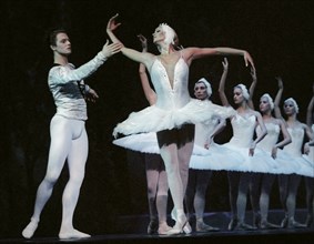 Ballerina anastasia volochkova (center) dances in the 'stairs to the sky'ballet-fantasy on the stage of the kremlin palace on thursday, 11,2003    .