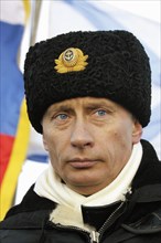 Russian president vladimir putin seen aboard the heavy missile-carrying submarine cruiser arkhangelsk from where he watched large scale exercises in the barents sea, severomorsk, russia, february 17,2...