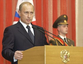 President of russia vladimir putin speaking at the solemn celebration of the fatherland defender's day in the kremlin palace, moscow, russia, february 22,2004.