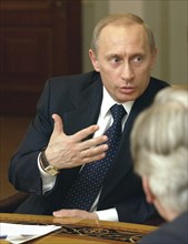 President of russia vladimir putin during his meeting with leadership of the maly and alexandrinsky theatres in novo-ogaryovo,  moscow region, russia, march 2,2004.