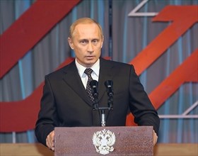 President of russia vladimir putin holding the floor at the solemn meeting held to mark the 70th anniversary since establishing the hero of the soviet union award, moscow, russia, april 14,2004.