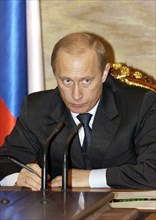 President vladimir putin during the sitting with members of the government in the kremlin, moscow, russia, april 19, 2004.