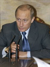 Russian president vladimir putin speaks during the meeting with the government, moscow, russia, april 26, 2004    .